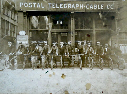 Delivery boys sending telegraphed messages to their receivers