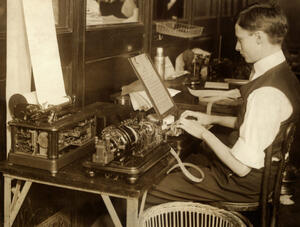 Man operating telegraph from home